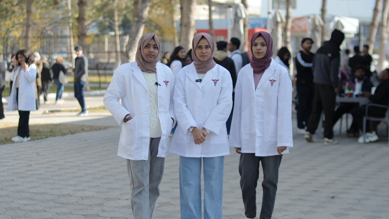 Razak Aviyoor with students at a partner university abroad